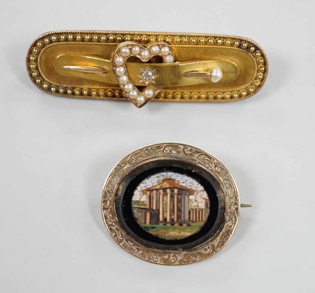 A late Victorian 15ct gold, diamond chip and seed pearl set heart and pin bar brooch, 44mm, gross weight 6.2 grams and a Victorian yellow metal and micro mosaic brooch.